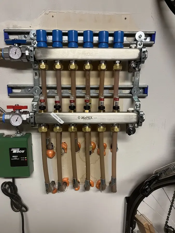 Plumber performing Gas Line Installation at a residential property in Fruitport